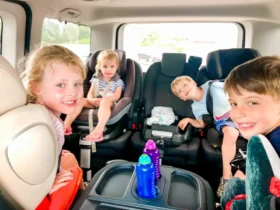 Kids and adults enjoying fun games during a car journey